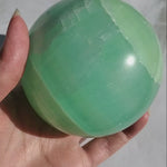 Load and play video in Gallery viewer, Caribbean Calcite Sphere Large
